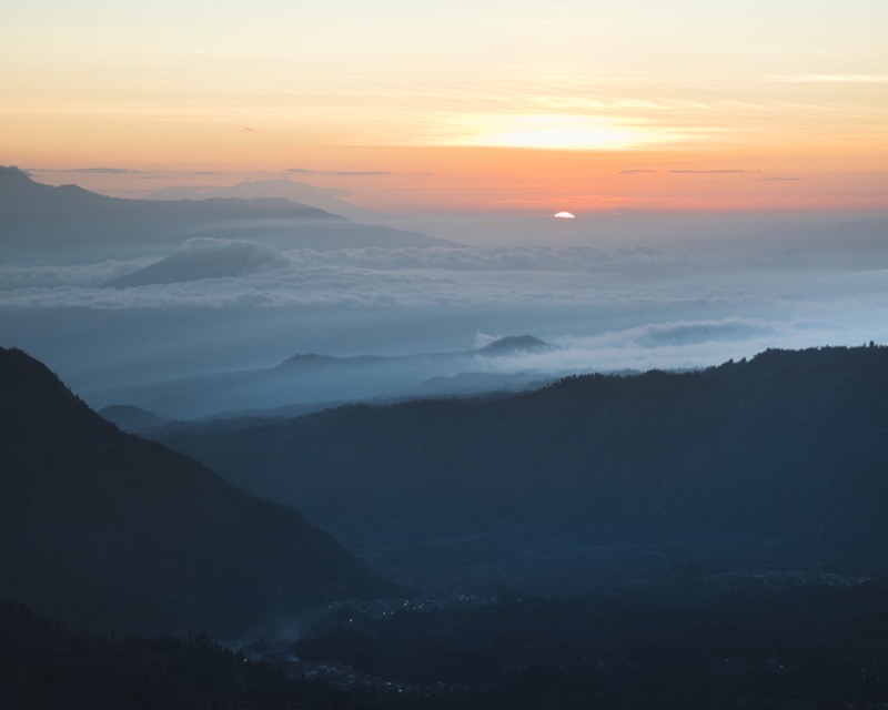 Sunrise over cloudy valley in Java, Indonesia