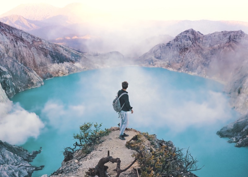Mt. Ijen, Kawah Ijen, man standing over blue volcanic lake